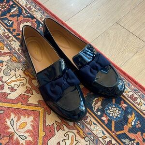 Navy blue women’s loafers with bow
